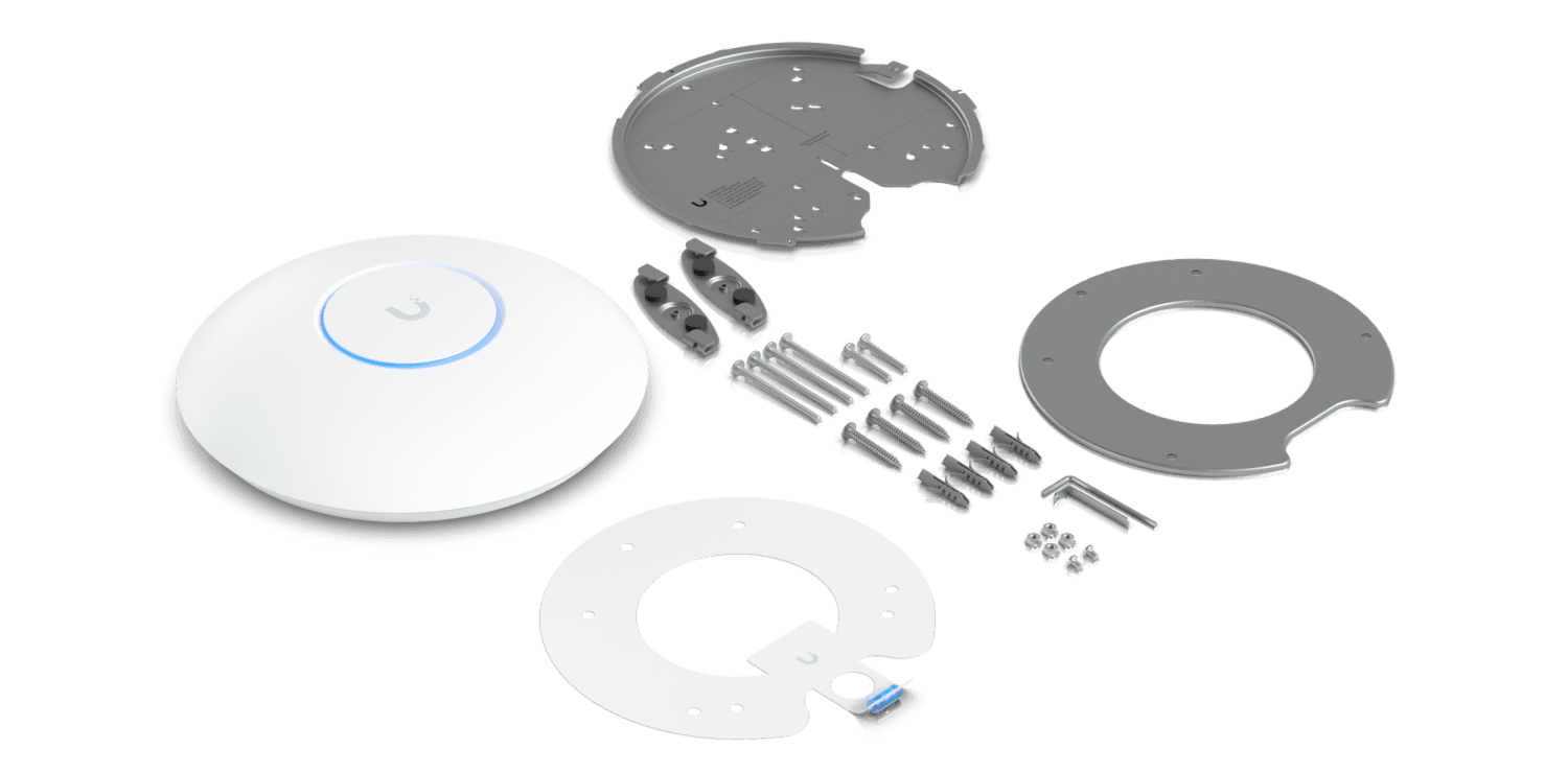 Contents of the U7 Pro box: the access point, the Pro Mount plates, mounting clips, screws, wall anchors, a hex key and a paper mounting template