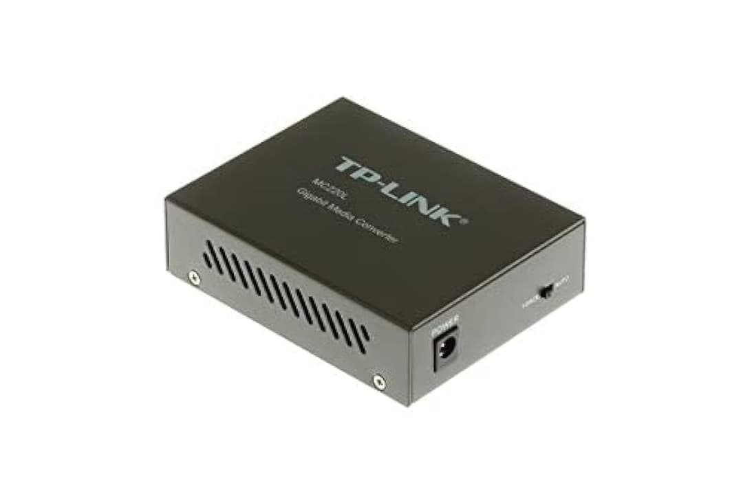 TP LINK 1000M RJ45 to 1000M SFP slot supporting MiniGBIC modules switching power adapter - Image 1